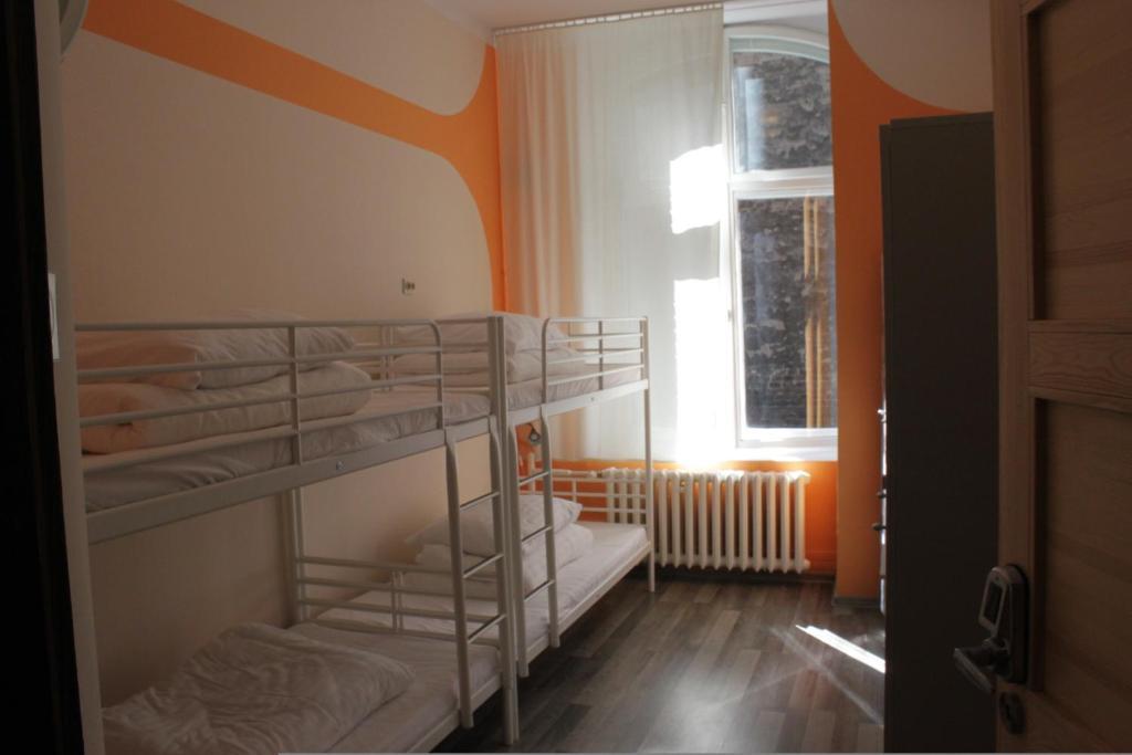 Posto Letto in Dormitorio con 4 Letti