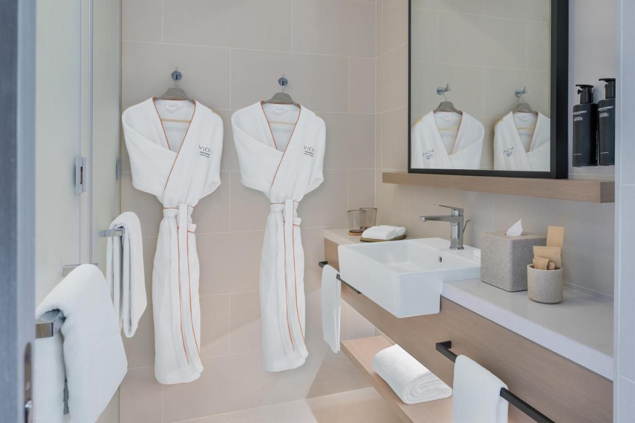Deluxe Kamer met Kingsize Bed - Uitzicht op de Stad en Eigen Balkon