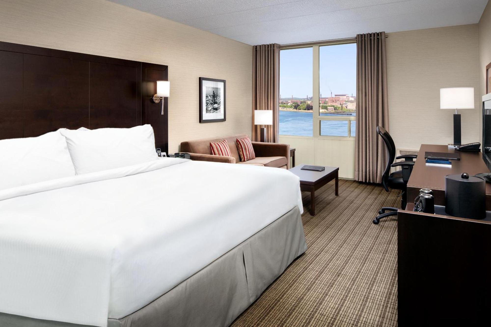 Deluxe, Guest room, 1 King, Sofa bed, Water view