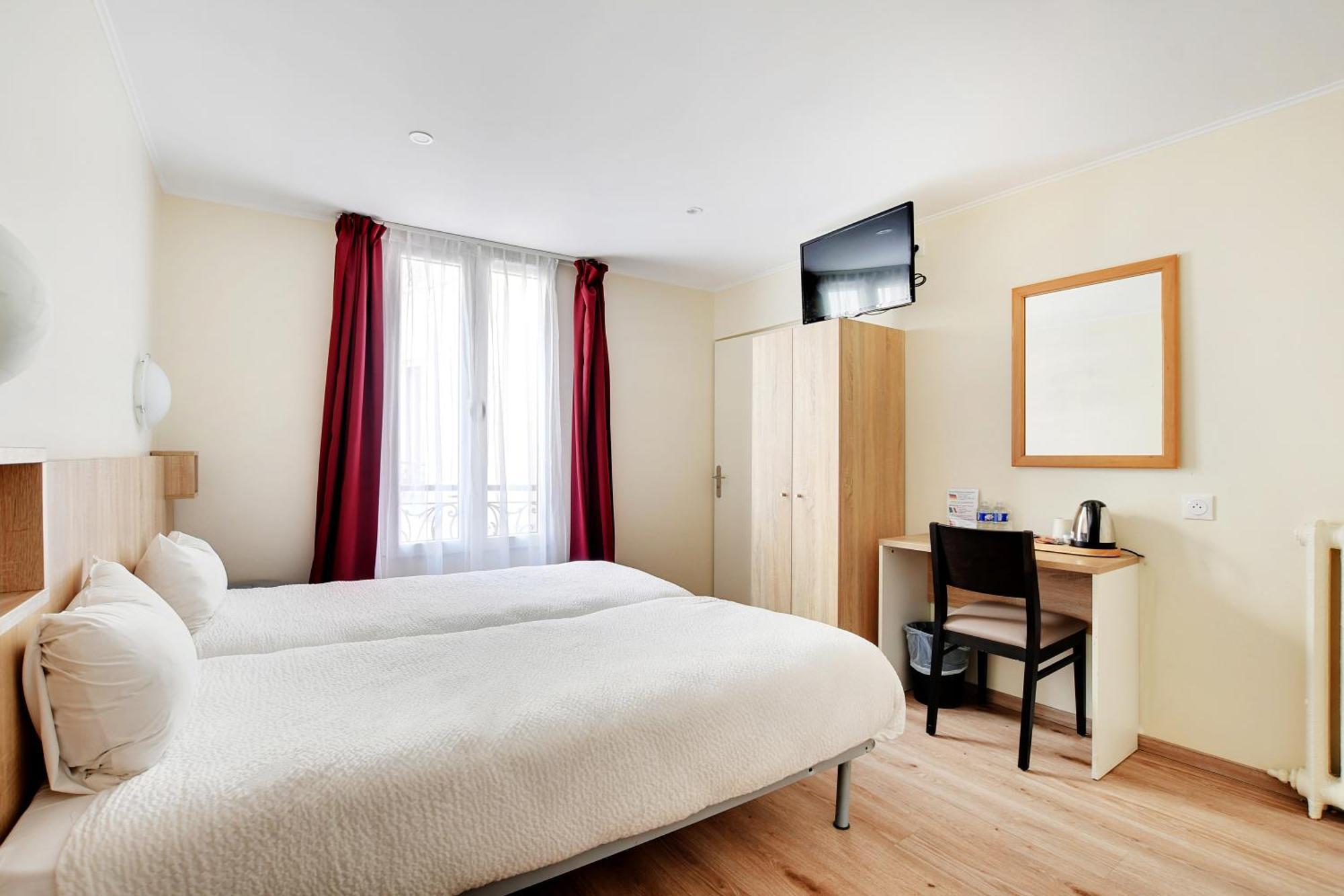 Quarto com 2 Camas de Solteiro