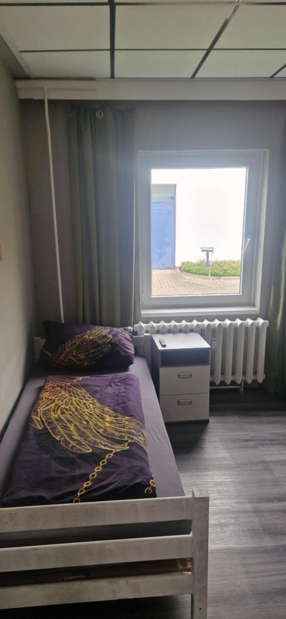 Single Room with Shared Shower and Toilet