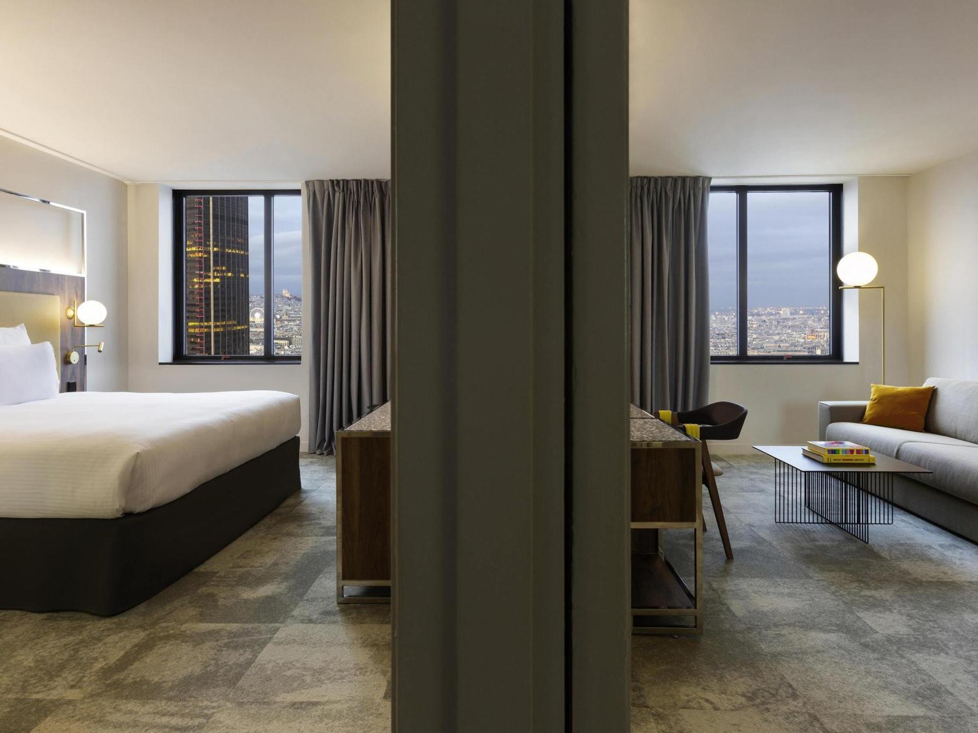 Deluxe Suite with one King Size Bed and one Sofa with City View