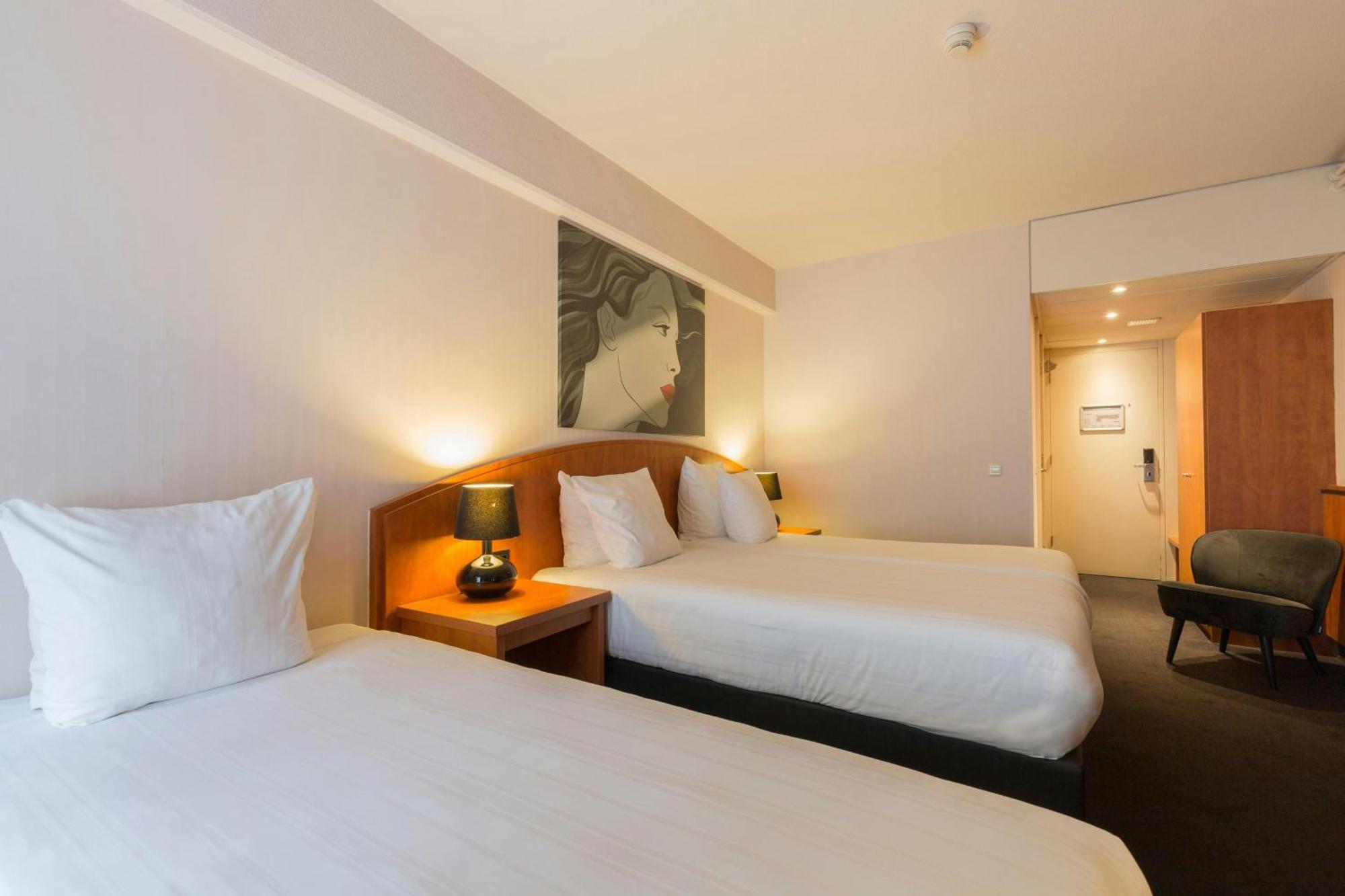Comfort Room 1 Twin Bed 1 Single Bed