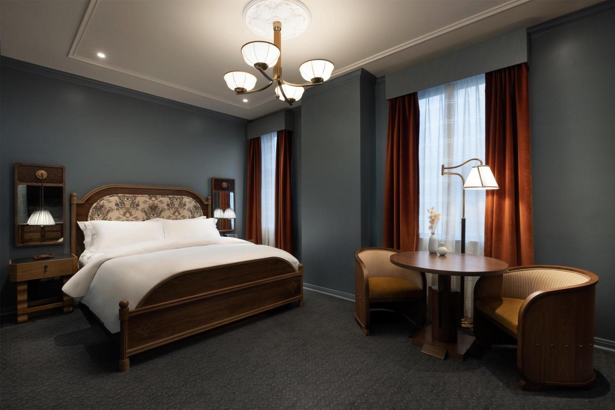 Quarto com Cama King-size e Vista da Cidade