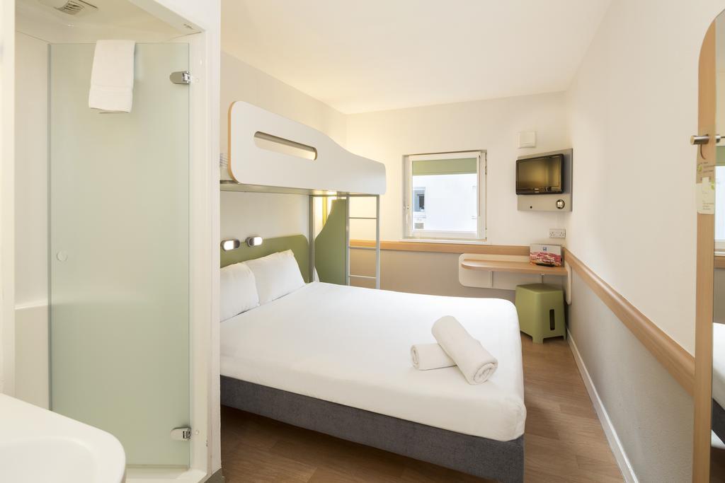 Habitación Triple - 1 cama doble y 1 litera