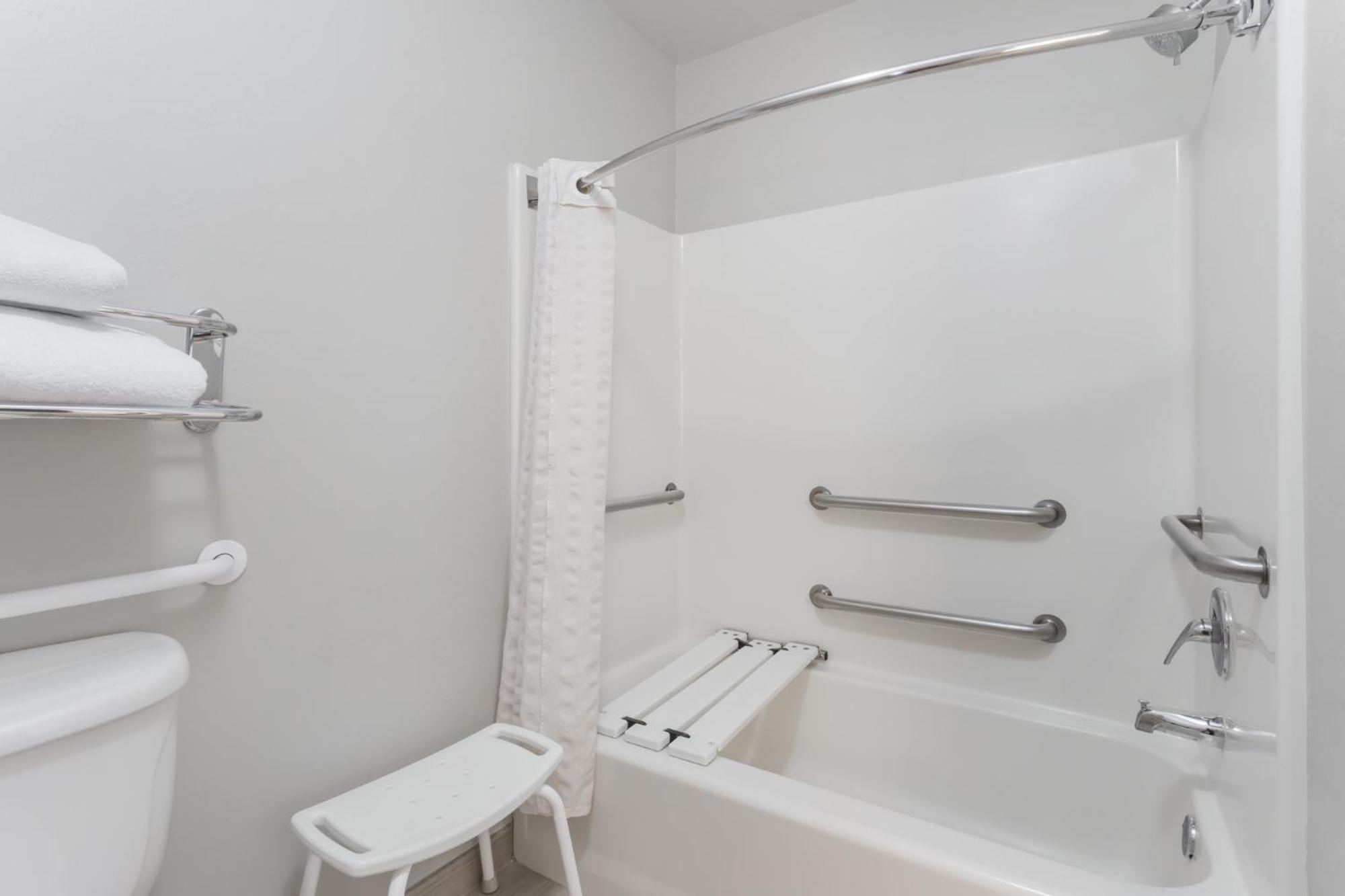 King Room One King Bed Bathtub Grab Bars Pool View Accessible Non-Smoking,1698881329:JPEG