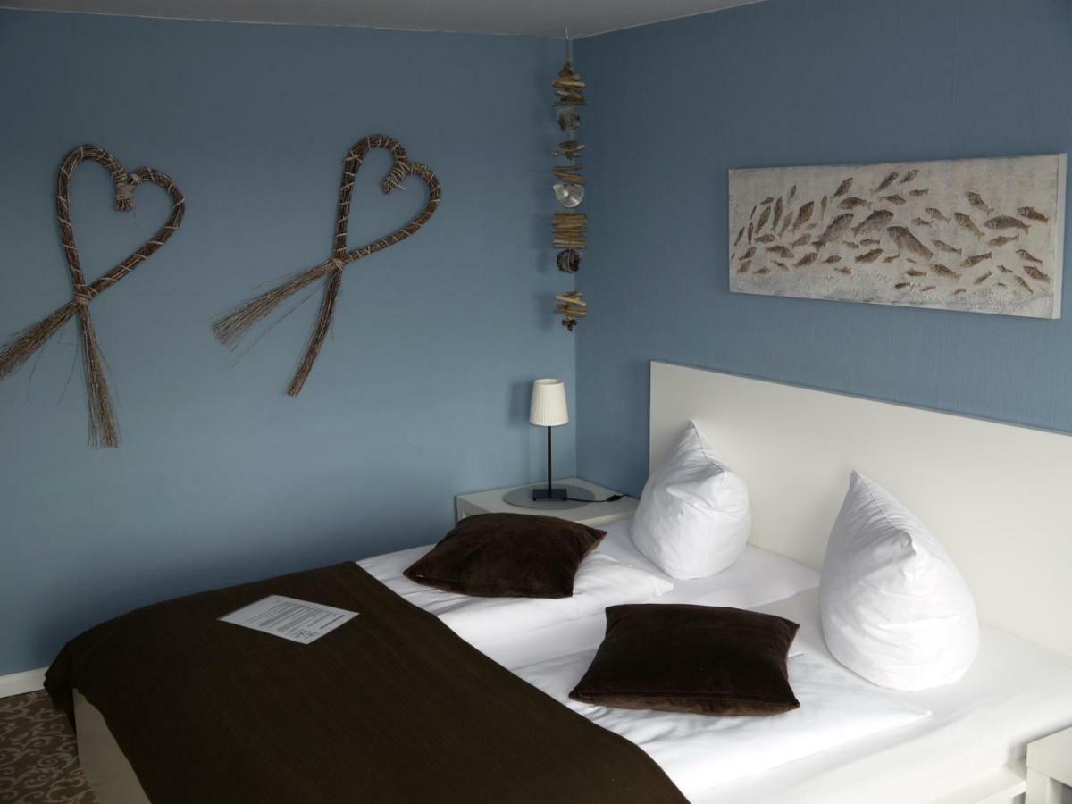 Doppelzimmer mit Balkon und Flussblick
