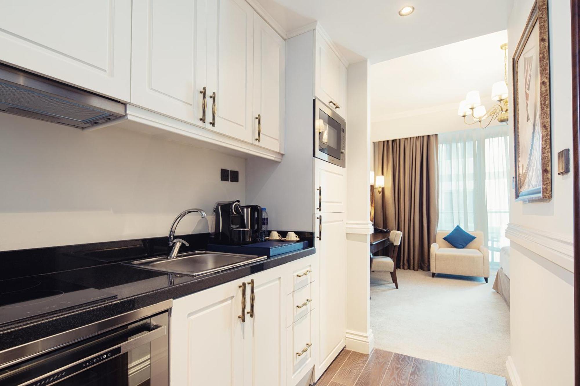 Estudio Deluxe en una playa privada, con piscina infinita y acceso al Lazy River y al club infantil