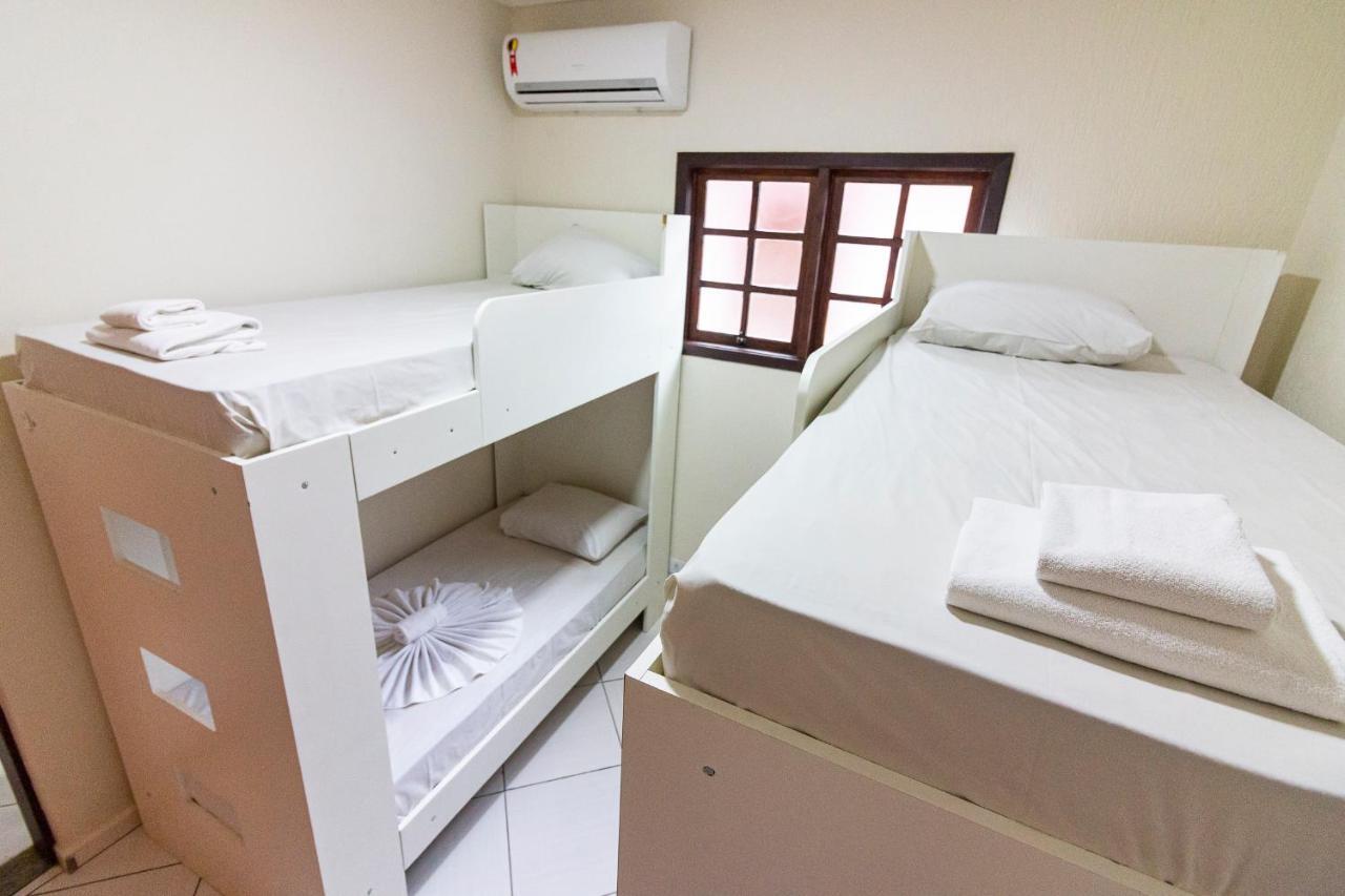 Cama em Dormitório Misto com 4 Camas