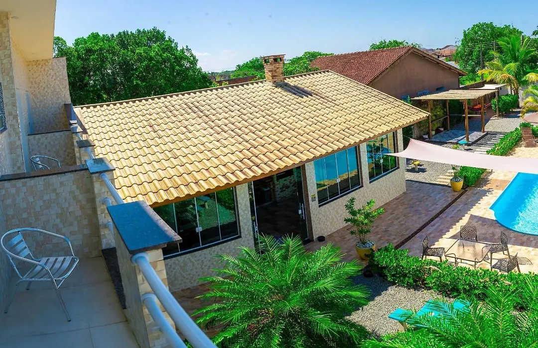 CASA PREMIUM em Peruíbe com FOGUEIRA, Brinquedoteca, Piscina, Lareira de Jardim, Churrasqueira e 4 grandes quartos para 16 pessoas!-1