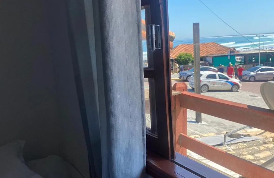Suites e Quartos Em frente a Praia Grande -Na orla Flavia Alessandra-1