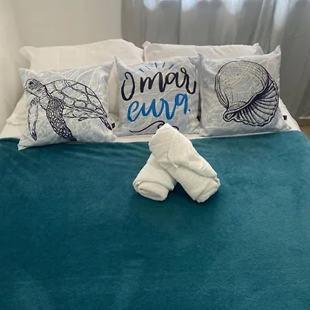 Suites e Quartos Em frente a Praia Grande -Na orla Flavia Alessandra-2