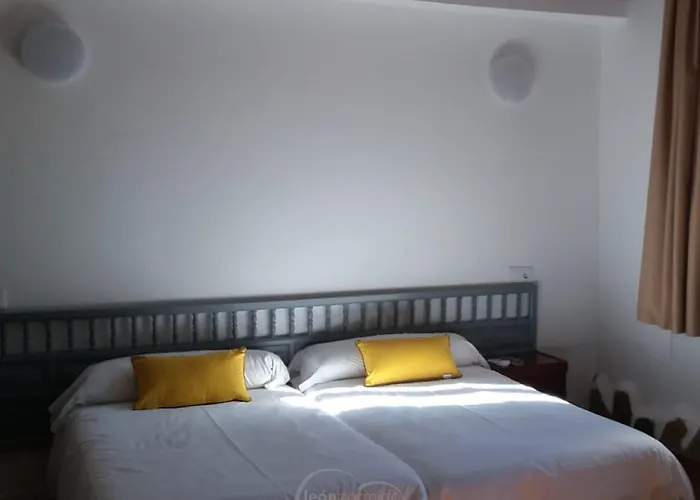 Hotel cerca del colegio: Leon Dormido Rooms & Apartments