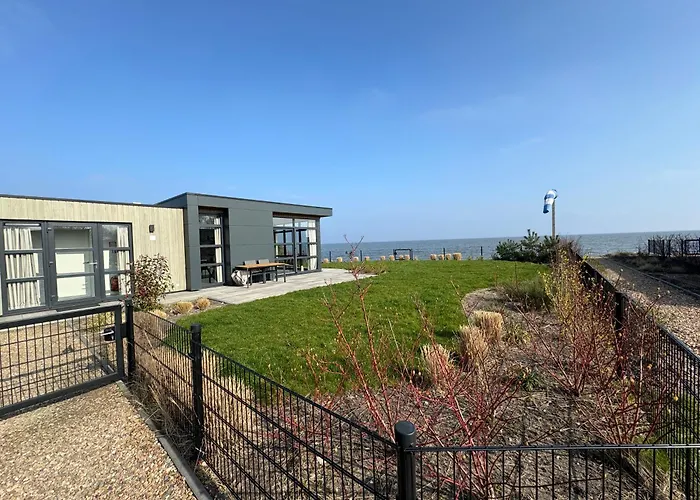 Enkhuizer Strand Chalet Meeresrauschen Erste Reihe mit Zaun Haus Nr 249