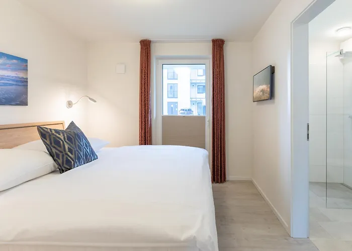 Ferienwohnung Nordseetraum direkt am Nordseedeich mit Blick auf den See