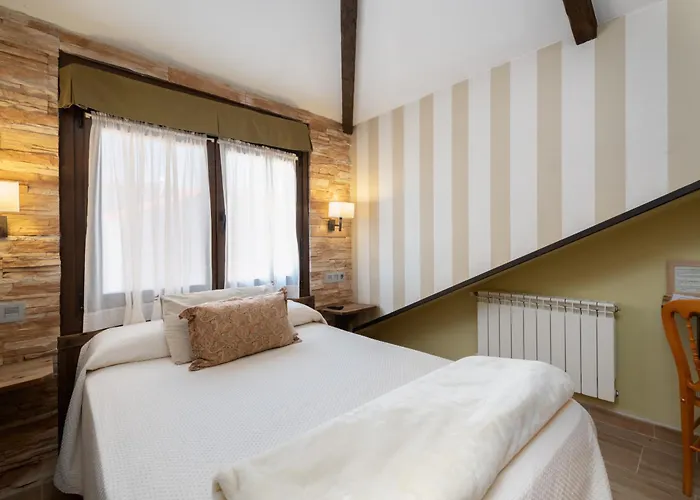 Casa de huéspedes: Cimavilla Rooms