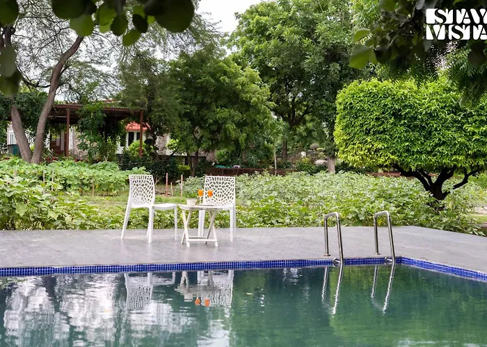 Vacation rental: Stayvista's Glasshouse: Orchard Farmstay with Pool and Relaxation