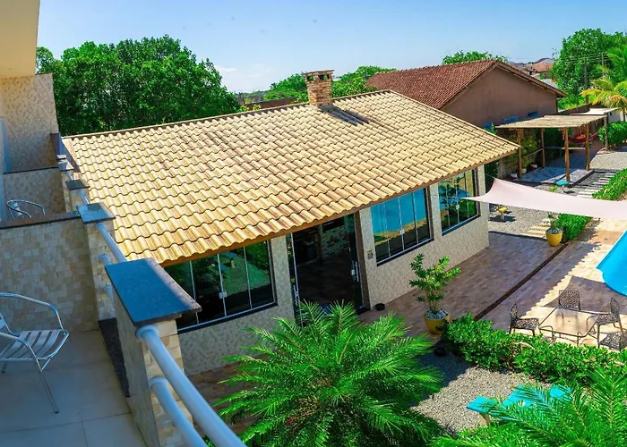 CASA PREMIUM em Peruíbe com FOGUEIRA, Brinquedoteca, Piscina, Lareira de Jardim, Churrasqueira e 4 grandes quartos para 16 pessoas!